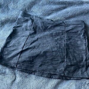 Black textured swim skirt